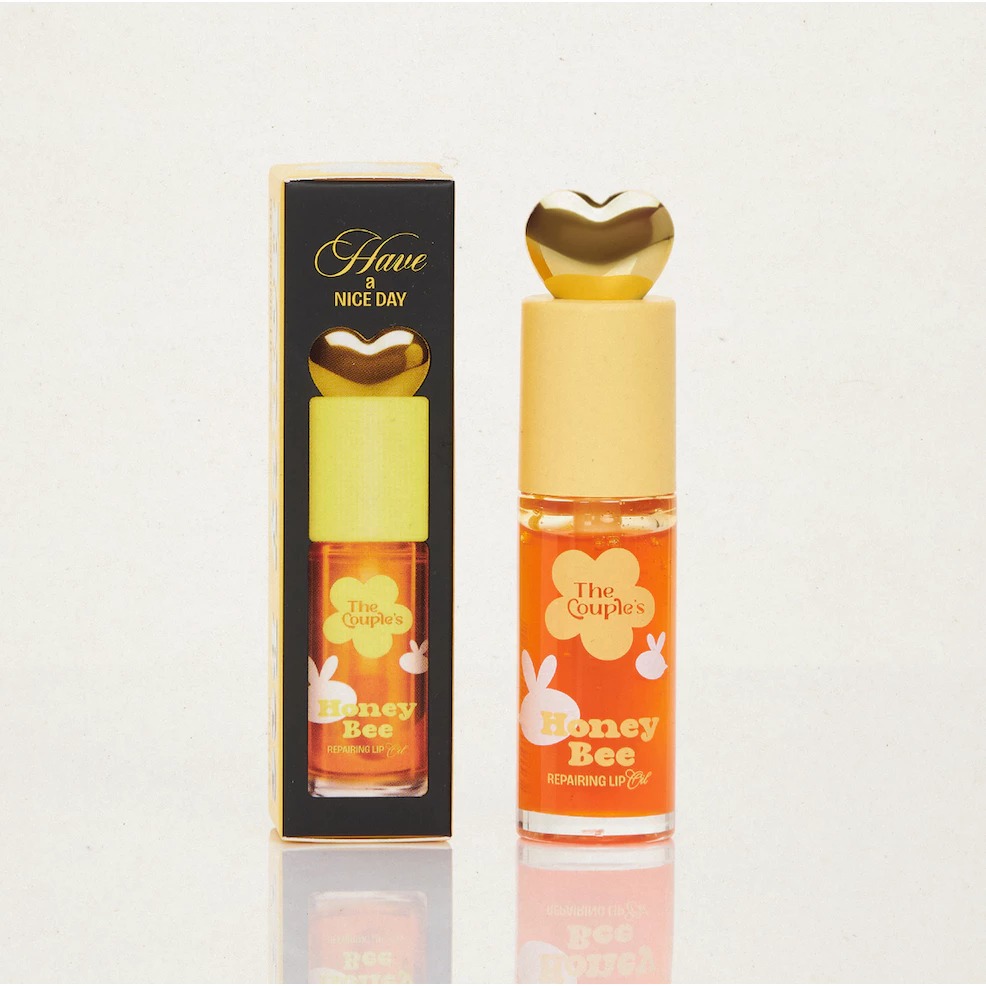 ลิปออยล์ The Couple's Honey Bee Repairing Lip Oil